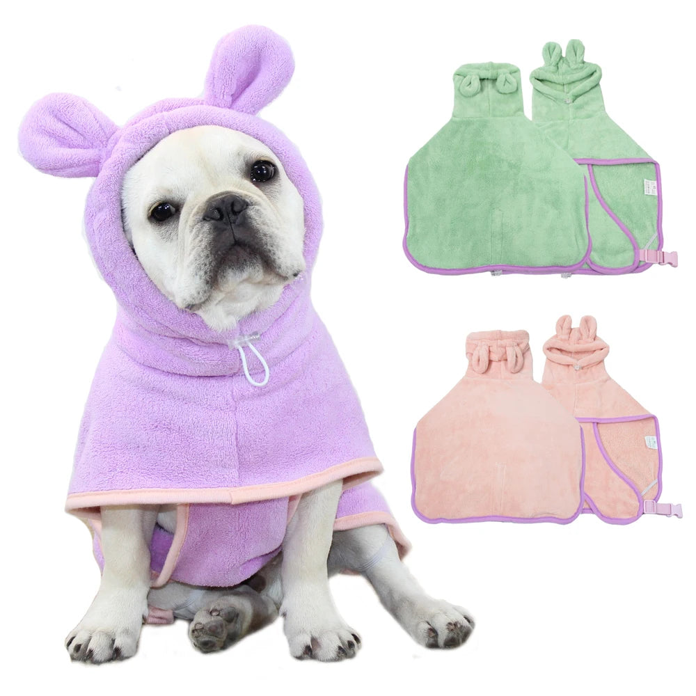 French Bulldog wearing a purple MuddyMate hooded microfibre dog drying robe, with pink and green colour options